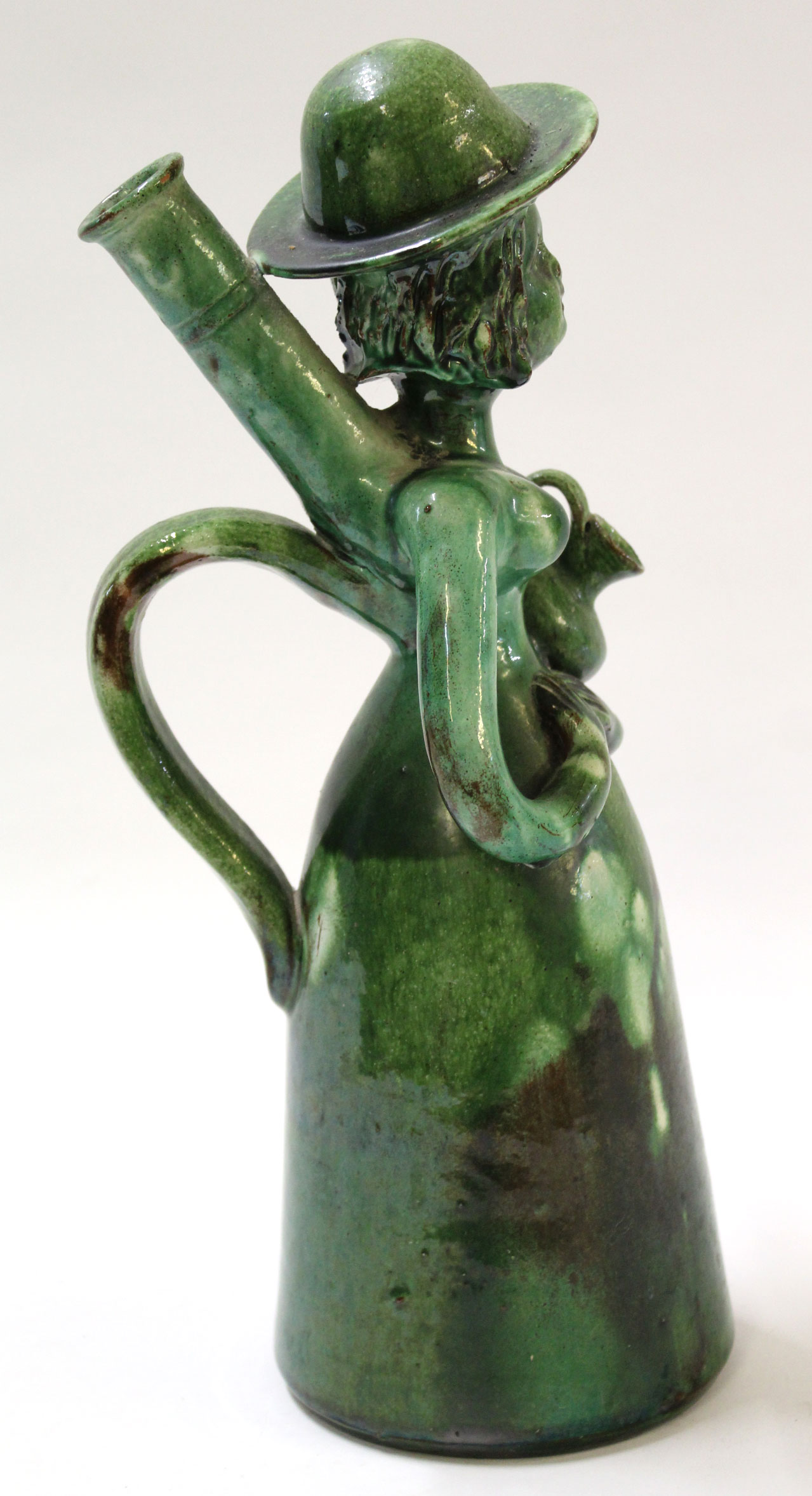 Unusual pottery sculpture of a woman with jar under her arm, green glazed with monogram JJ to - Image 2 of 5