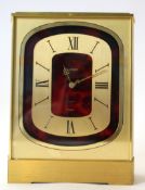 Late 20th century gilt bronze and faux tortoiseshell Luxor mantel clock, the face inscribed "Garrard