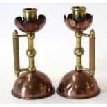 Pair of brass and copper candlesticks in Arts & Crafts style, possibly after a design by Christopher