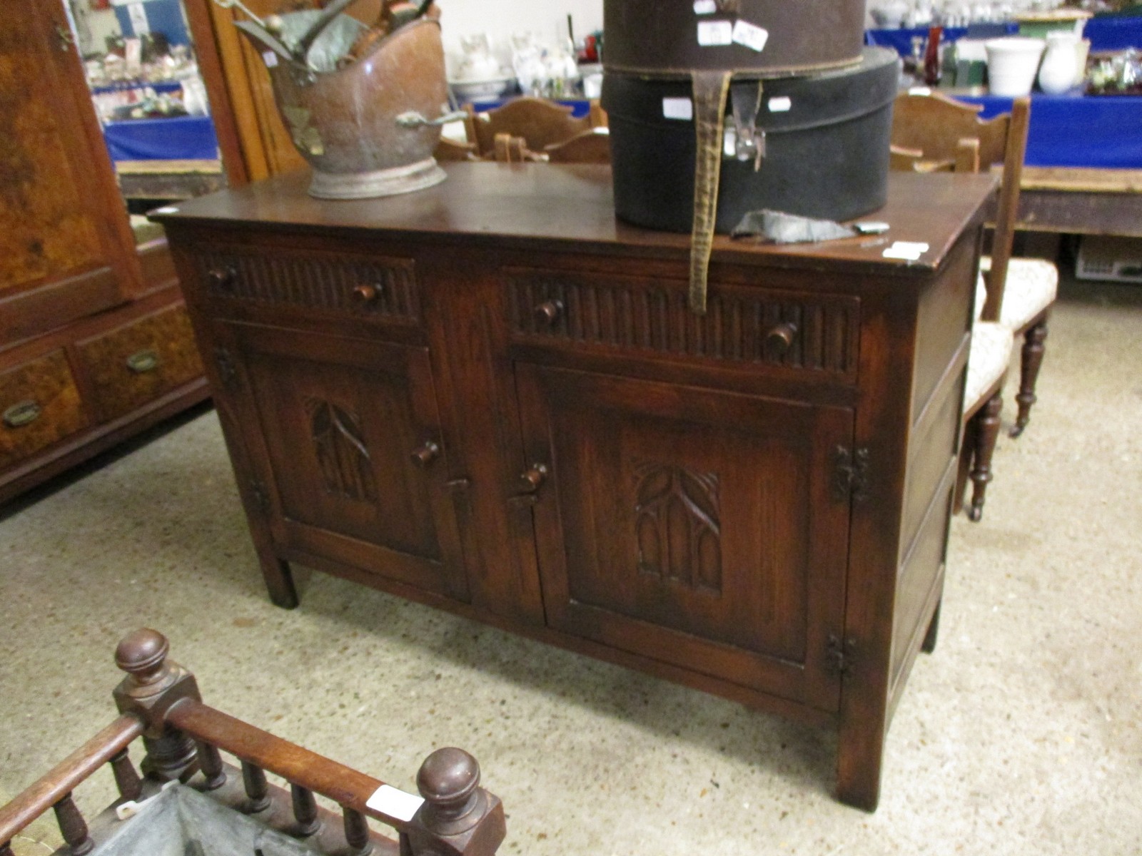 OLD CHARM SIDEBOARD WITH TWO DRAWERS OVER TWO PANELLED CUPBOARD DOORS WITH TURNED KNOB HANDLES