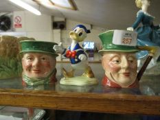 TWO BESWICK CHARACTER JUGS OF MR MICAWBER AND TONY WALKER, TOGETHER WITH A BESWICK WALT DISNEY