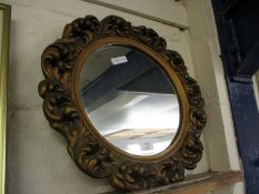 CIRCULAR MIRROR MOUNTED WITHIN A ROCOCO STYLE FRAME, DIAM APPROX 43CM