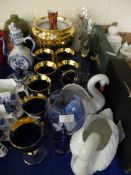 LARGE QUANTITY OF VARIOUS GLASS AND CERAMICS INCLUDING TWO SWAN PLANTERS, GILT TRIMMED GLASSES ETC