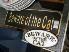 TWO CAST METAL "BEWARE OF THE CAT" SIGNS, LARGER APPROX 35CM