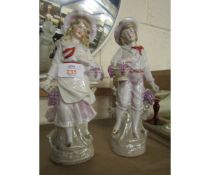 EARLY 20TH CENTURY CONTINENTAL PORCELAIN FIGURES OF A GIRL AND A BOY (2)