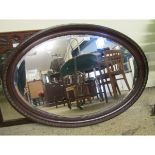 MAHOGANY OVAL WALL MOUNTED MIRROR