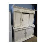 LARGE FRENCH PAINTED CUPBOARD, THE TOP FITTED WITH THREE CARVED PANEL DOORS, THE BASE WITH THREE