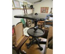 EBONISED HARDWOOD SHAPED TOP TABLE WITH TURNED COLUMN WITH SECOND CIRCULAR TIER ON A QUATREFOIL BASE