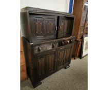 MID-20TH CENTURY LINENFOLD FRONT COURT CUPBOARD WITH TWO DOORS OVER TWO DRAWERS AND TWO LINENFOLD