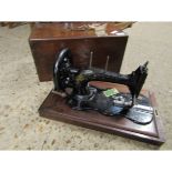 MAHOGANY CASED SEWING MACHINE