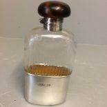 Early C20th glass & hall marked silver mounted hip flask with tortoiseshell top retailed by