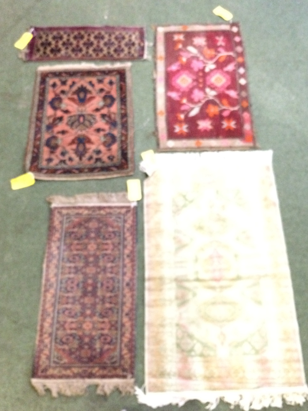 5 small rugs