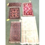 5 small rugs