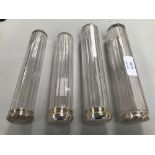 Set of 4 glass vanity bottles with hallmarked silver tops