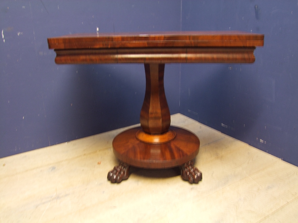 Mahogany & inlaid fold over tea table on 4 column & circular banded legs 91Wx46Dx74H cm