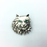 Sterling silver cat brooch with emerald eyes