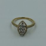 18ct Yellow gold marquise shaped diamond cluster ring of 60 points