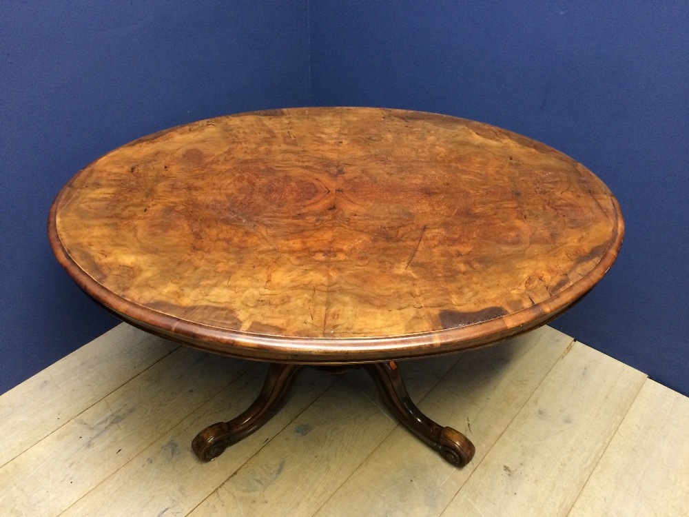 Victorian walnut veneer oval snap top breakfast table to quadruped base and china castors. 135 x 103 - Image 2 of 2