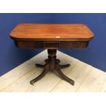 Regency mahogany fold over tea table on quarduped swept legs to brass castors 87 cm wide