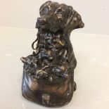 Continental bronze lidded ink well as a dachshund carring her puppies in a bag 12H cm