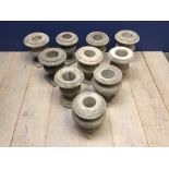 10 similar small stone pedestal urns approx 30 cm h average - some chips and losses