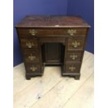 George III ladies mahogany knee hole desk, with 7 drawers with pierced brass drop handles,