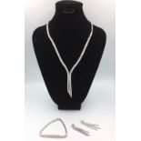 Suite of silver 7 cubic zirconia jewellery to include necklace, earrings, bracelet