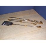 Set of 3 matching polished steel & brass fire irons C20th