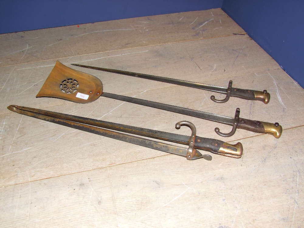 Set of steel fire irons made from C19th French steel bayonets, inscribed & dated 1877