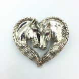 Heart shaped silver brooch in the form of 2 Horses with ruby eyes