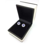 Pair of 18ct white gold tanzanite & diamond cluster earrings of 1.8cts