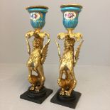 Pair of continental Georgian style, gilt metal & porcelain candlesticks winged Griffin type creature