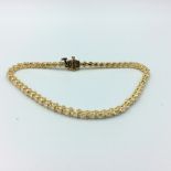 14ct Yellow gold diamond line bracelet of 2.5cts approx