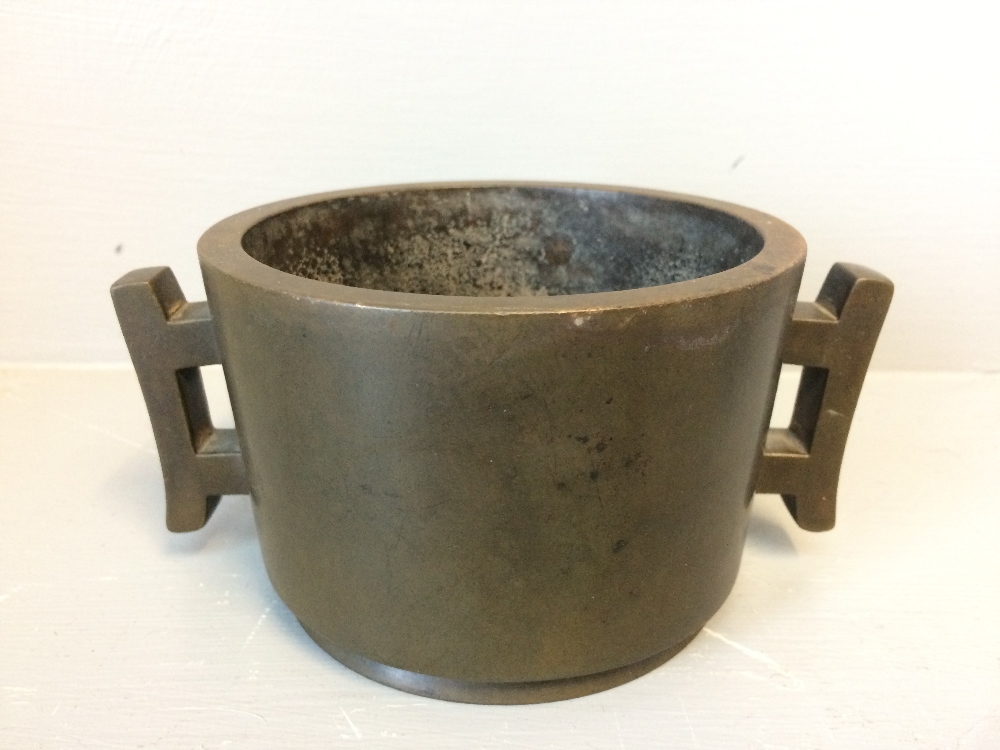 Bronze bowl with 2 handles 11.5cm X 8cm H