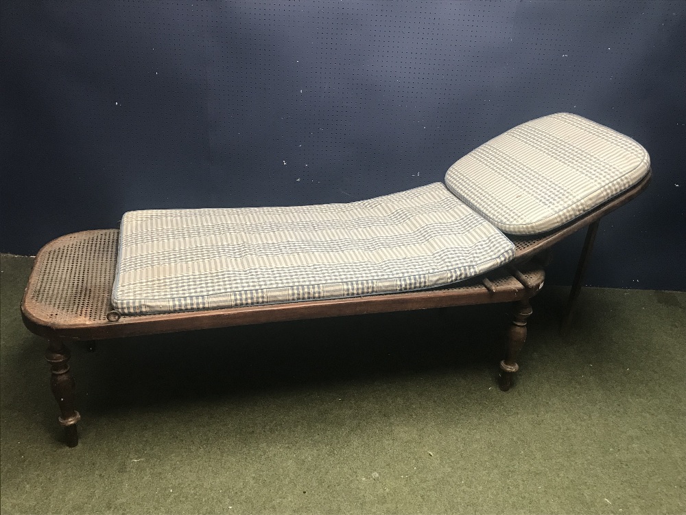 Bergère day bed with blue gingham cushions 72Wx205Lx47H cm
