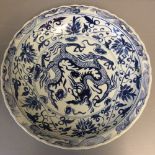 Oriental blue & white charger decorated with 3 toed dragon faux 6 character mark to base 44cm dia