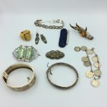 Collection of silver & white metal items, to include an enameled & pierced belt buckle, coin