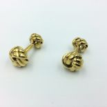 Pair of silver gilt cufflinks in the form of knots