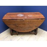 Light oak drop leaf table