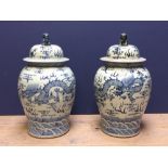 Pair of blue & white lidded temple jars 66cm