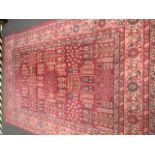 Persian rug with red central ground, beige border, all over floral motifs by Safarieh Mahal 2.31 X