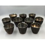 C20th Chinese coconut shells, with fitted internal liners, with Chinese characters to base (only 2