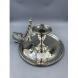 A late Victorian silver chamber candlestick with extinguisher, grey hound crest, D and J Wellby