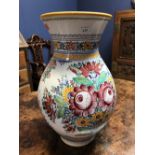 Large vase, brightly decorated with flowers