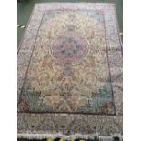 Pink,brown,green rug with blue & pink central medallion 204 x 300 cm