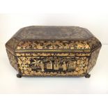 Black laquer Chinese work box on claw feet, decorated in gilt paint (interior needs to be repaired)