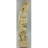 Japanese C19th carved bone figure of man supporting an eagle carrying an elder 38cm