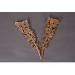 Pair of C18th/C19th Chinese ivory 'cloud and bat' carvings (2)