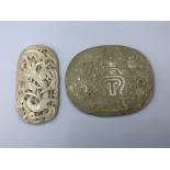 Chinese C18th/19th jade plaques depicting dragon & Shou character (2), some chips Provenance of lots