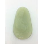 Chinese carved jade pebble depicting lady